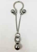 Omega Man is a patented stainless steel cock ring shaped like the Greek letter Omega with changeable stainless steel threaded balls.  Anal or butt plugs and large stainless steel balls can be attached as accessories for additional stimulation.