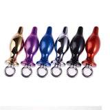 These are anal or butt plugs that can be attached to the Omega Man cock ring.