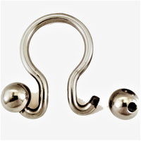 Omega Man is a patented stainless steel cock ring shaped like the Greek letter Omega with changeable stainless steel threaded balls. 